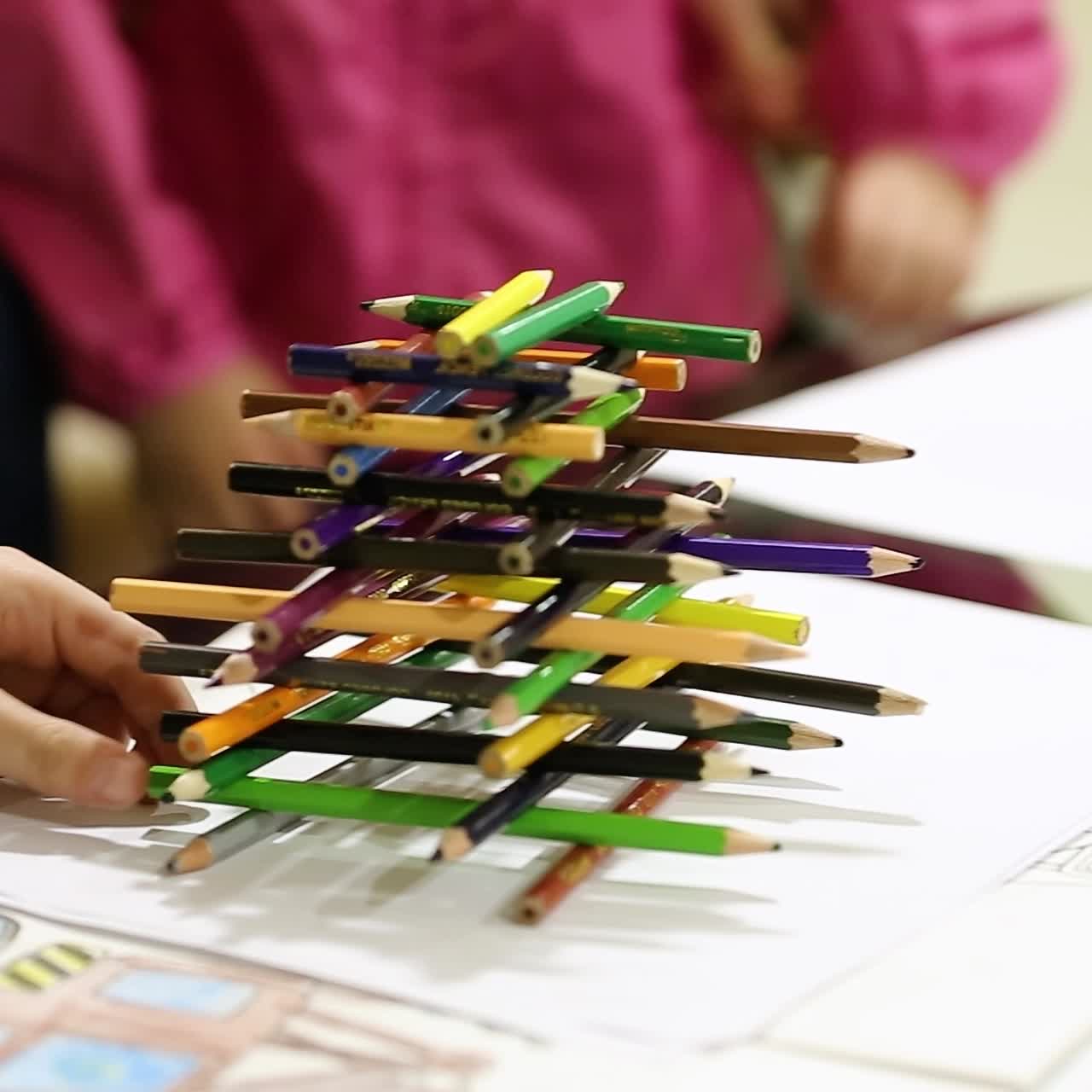 Child With Pencil In Play