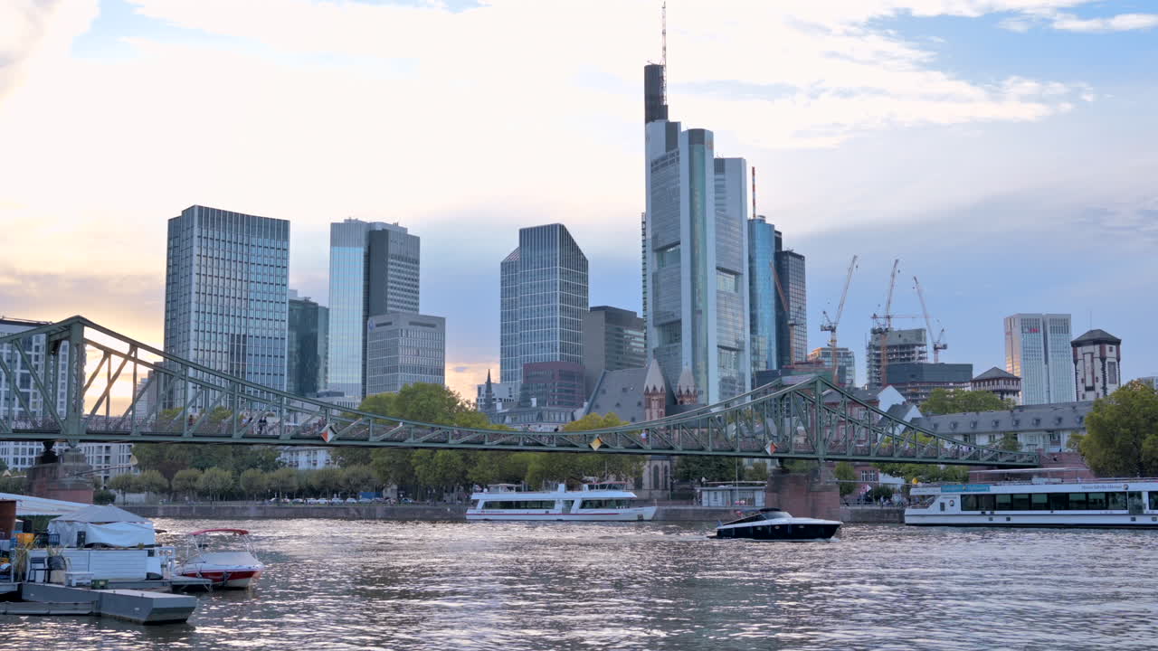 Frankfurt, Germany - September 15, 2022: Boats moving under the Iron Footbridge