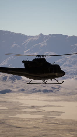 helicopter flying over desert