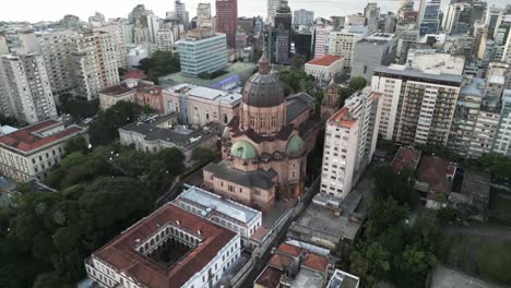 aerial view orbiting porto alegre metropolitan cathedral in downtown brazil cityscape matriz square