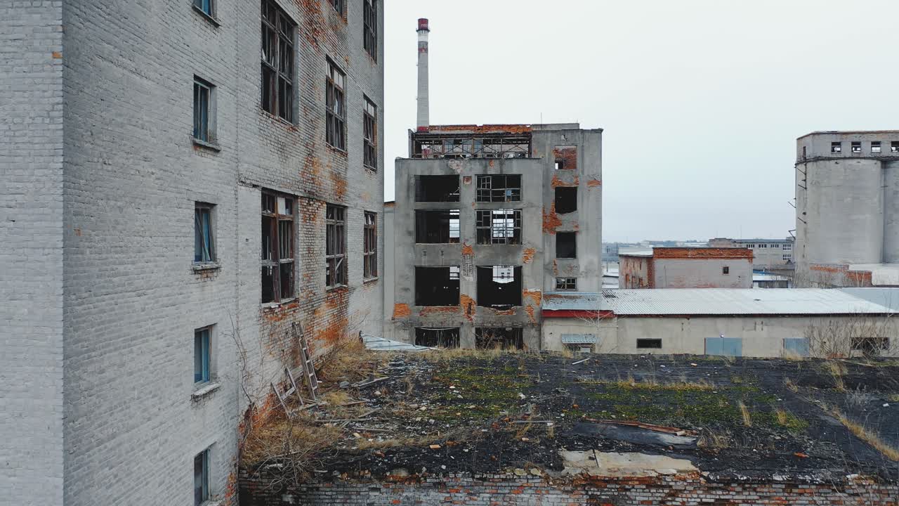 Aerial view of an old abandoned factory. Broken windows and doors