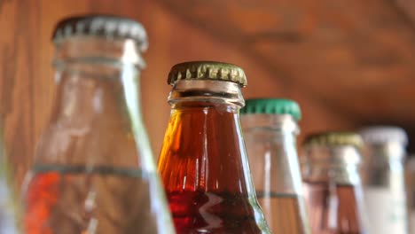 close-up of glass bottles of soda