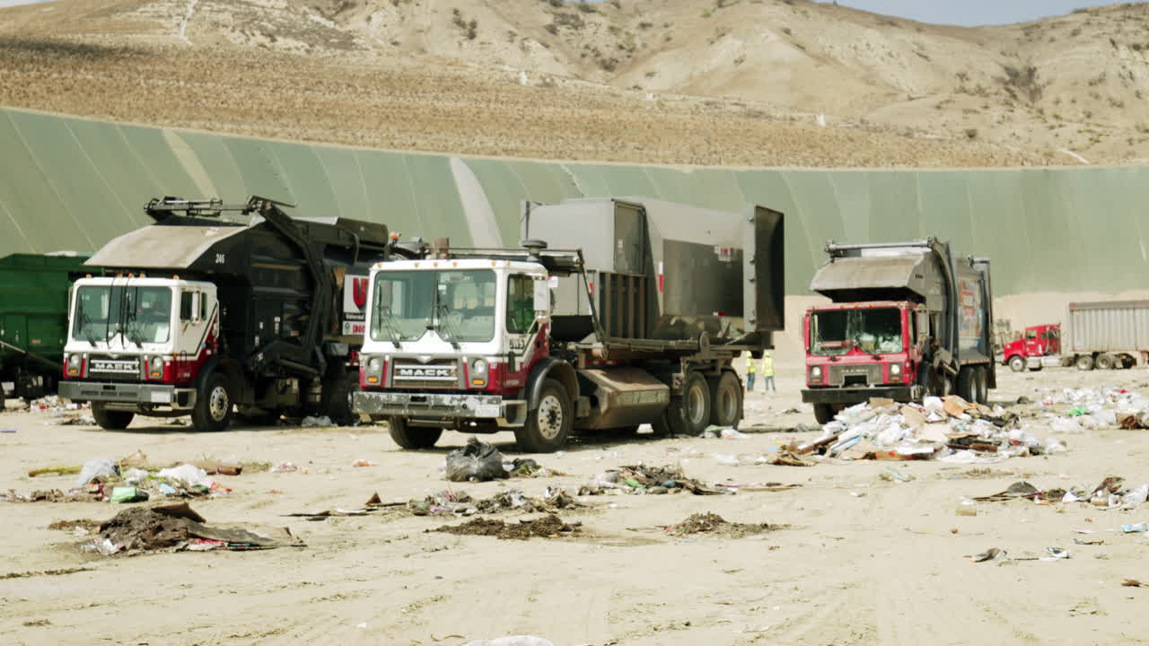 Garbage Trucks at a Landfill