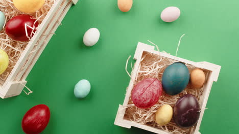 easter eggs on green background