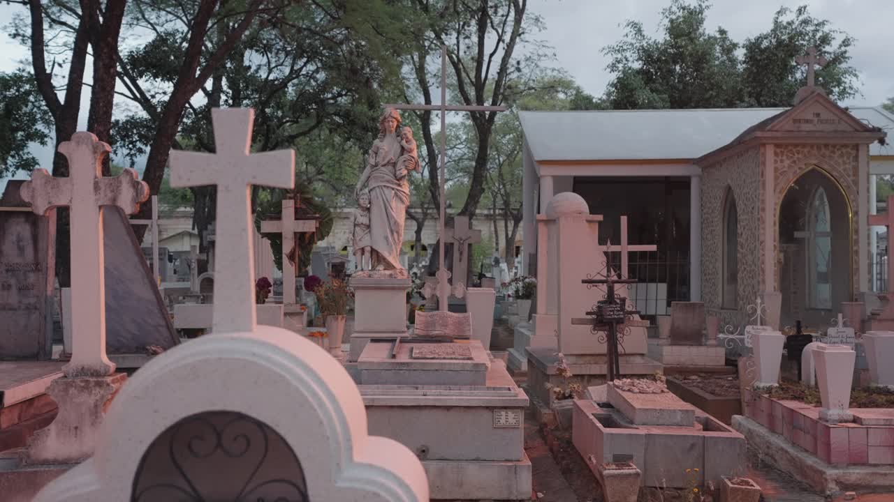 A Cemetery Scene with Tombs and Statues