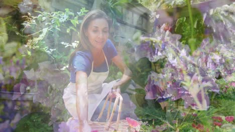 composite video of tall trees against caucasian woman keeping plant pots in a basket at the garden