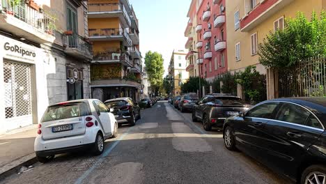 cars parked along a narrow street