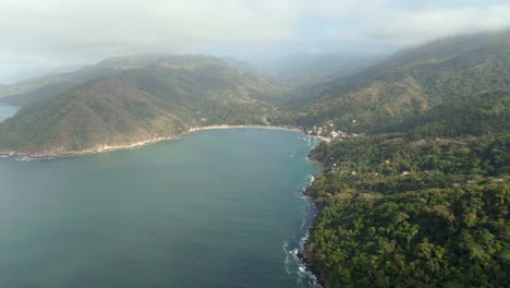 vista of tropical forest mountains at yelapa beach near puerto vallarta in jalisco, mexico. aerial wide shot