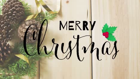 animation of merry christmas text over christmas decorations on wooden background