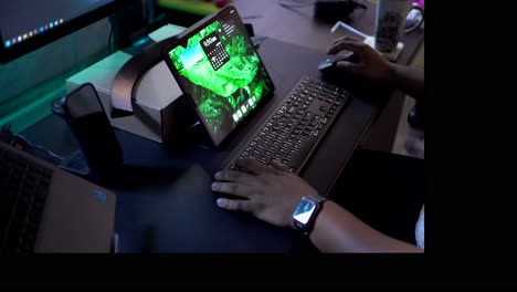 man typing on a keyboard working from home