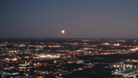 aerial timelapse of chattanooga, tennessee following the moon rise and traffice