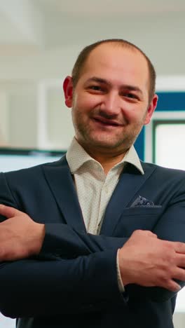 vertical video young man project manager smiling in front of camera