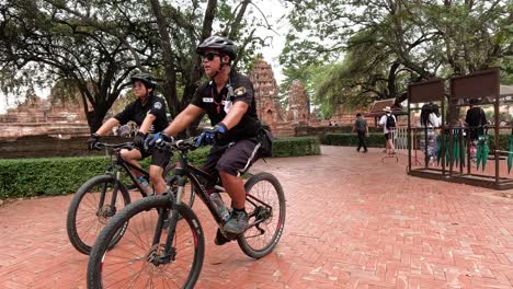 two police officers patrolling on bicycles