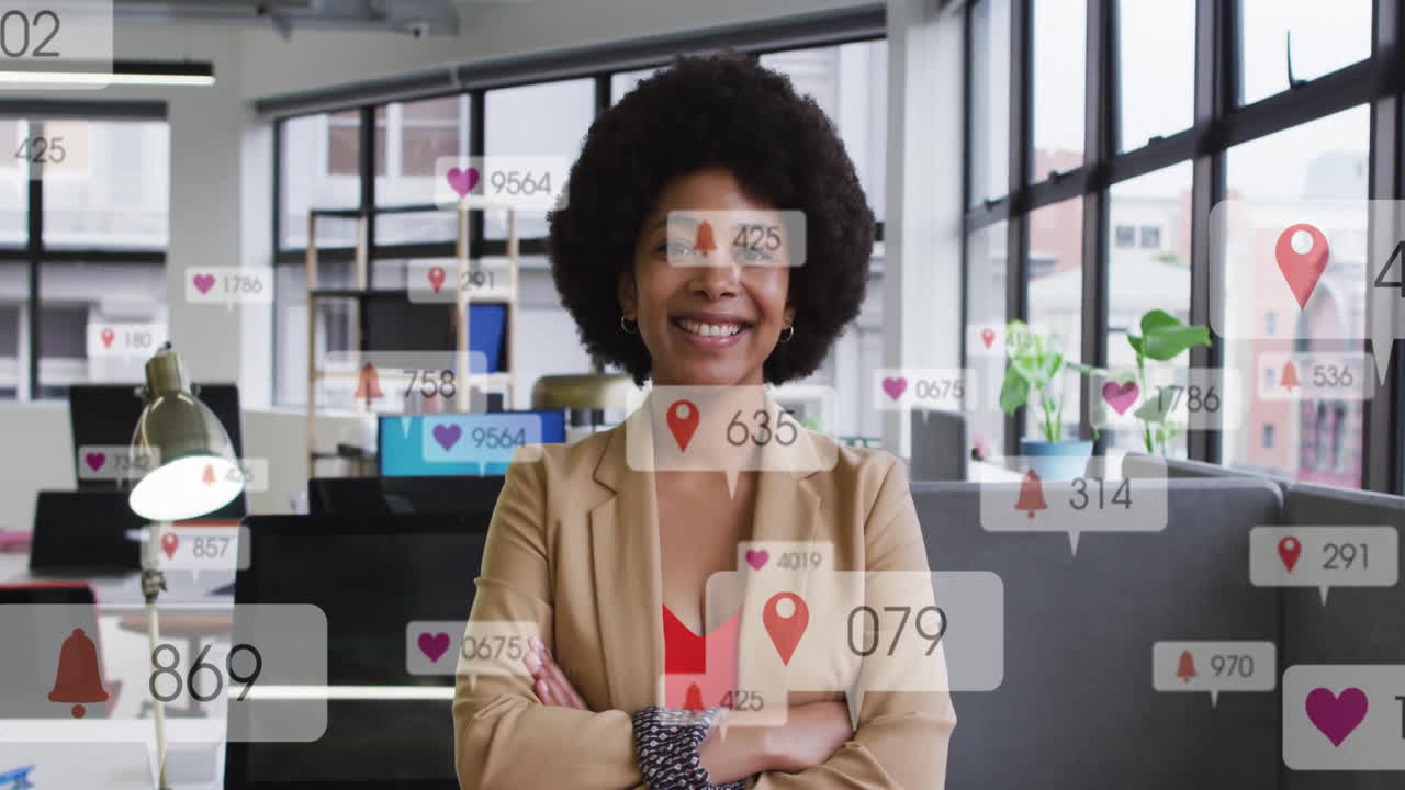 Animation of icons and numbers over african american businesswoman in office