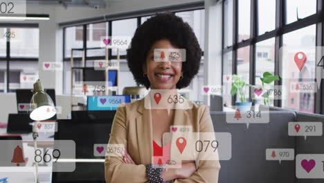 animation of icons and numbers over african american businesswoman in office