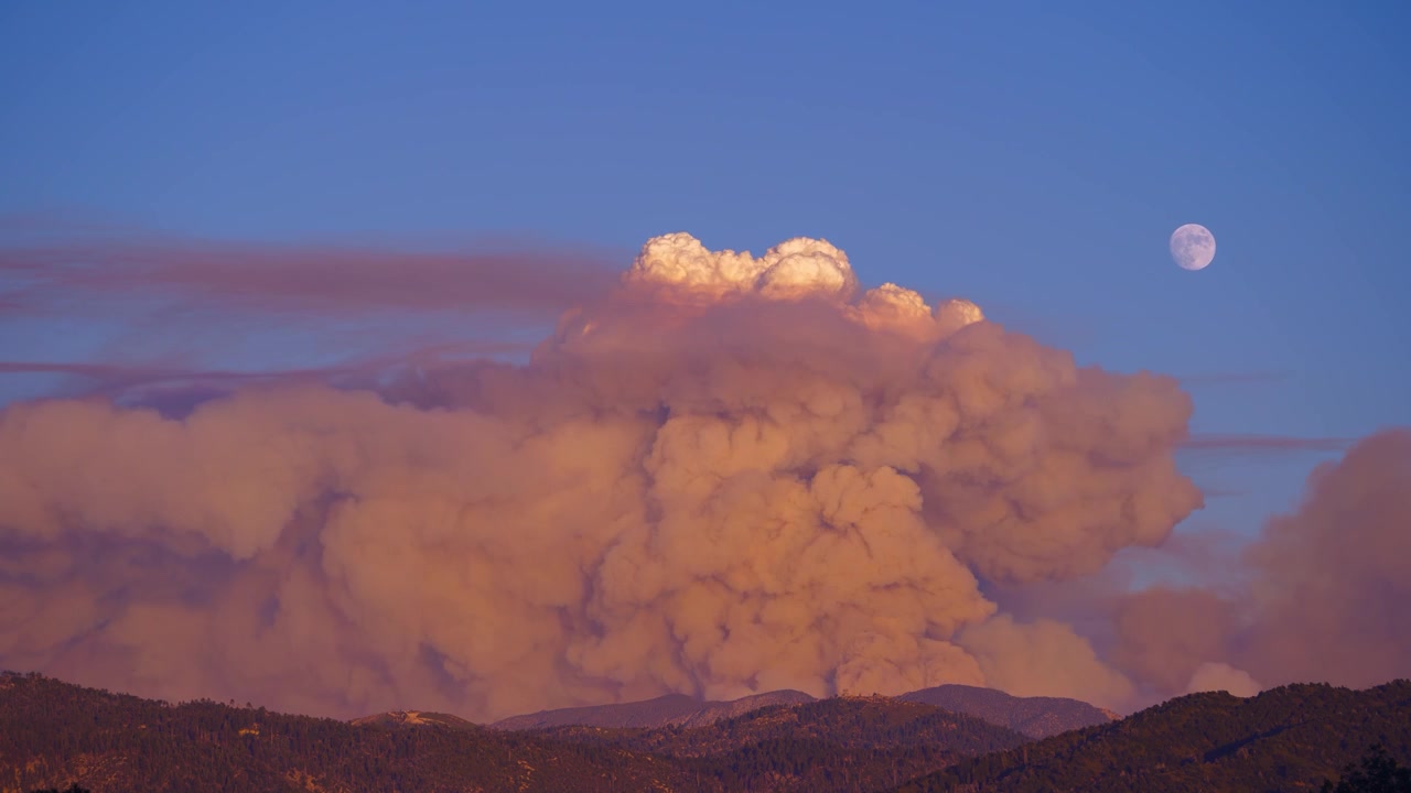 Time lapse of full moon rising over the Apple Fire in Cherry Valley near Oak Glen, Beaumont, and Banning in Riverside County, California, filmed from Lake Arrowhead California on August 1, 2020.