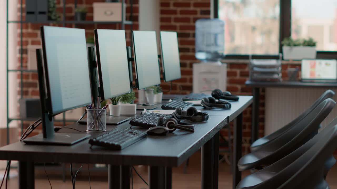 Empty telecommunication office with computers and headset