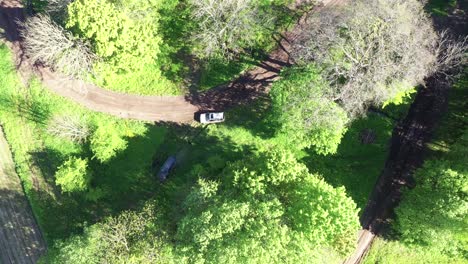 Vehicle-on-Side-of-the-Race-Track,-Broken-Car-Receives-Help,-Aerial