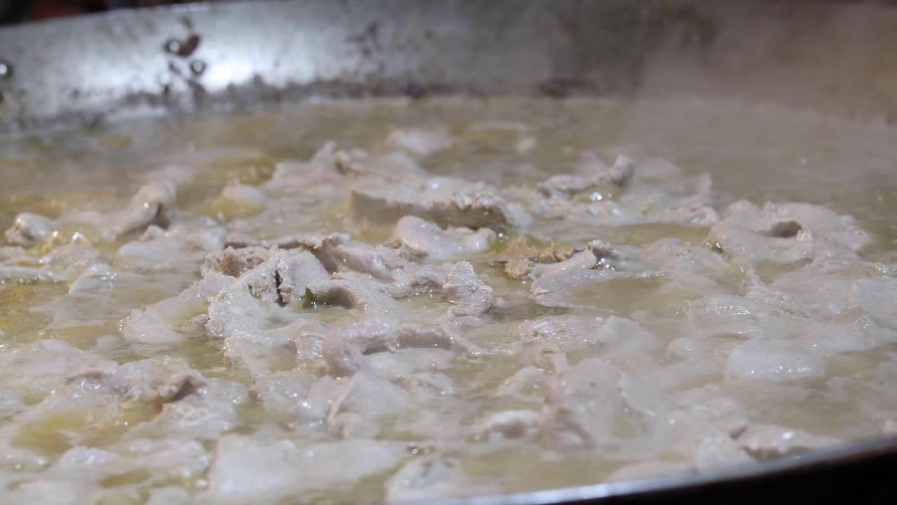 Street Food. Pork meat being cooked