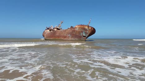 abandoned fishing boat after it ran aground and crashed on the shores