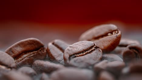 close up of seeds of coffee. fragrant coffee beans are roasted smoke comes from coffee beans.