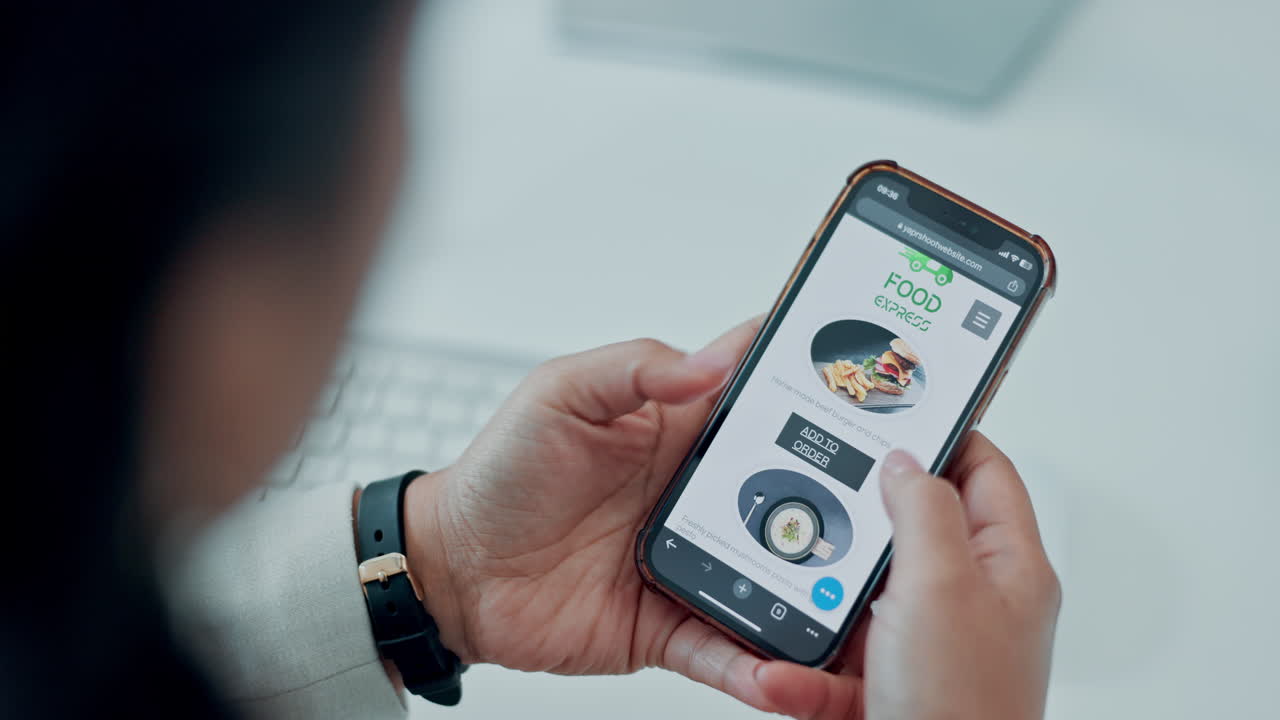 Person Scrolling Through Food Delivery App on Smartphone