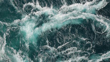 Blue-waves-of-water-of-the-river-and-the-sea-meet-each-other-during-high-tide-and-low-tide.