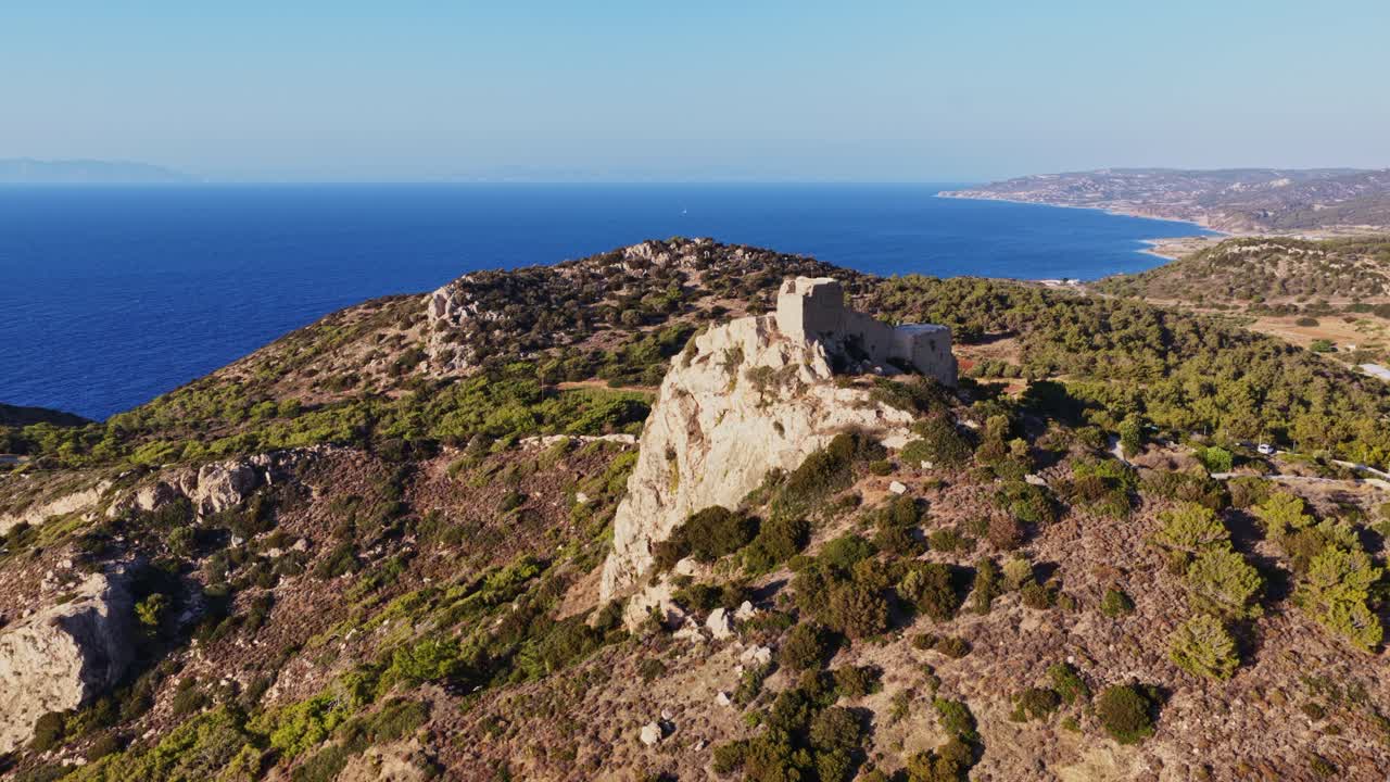 Aerial View of a Castle on a Mountain by the Sea