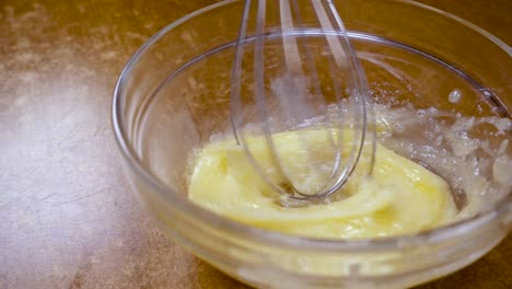 Crispy-yellow-corn-flakes-into-the-bowl-for-the-morning-a-delicious-Breakfast-with-milk.-Slow-motion-with-rotation-tracking-shot.