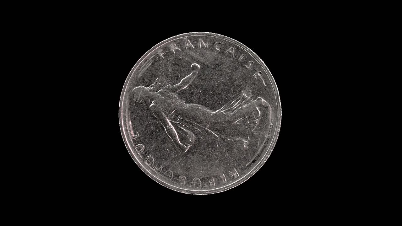 France 1960 1 franc coin obverse with the Sower by Oscar Roty rotating on black background