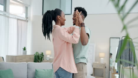 Love,-dancing-and-happy-black-couple-in-living