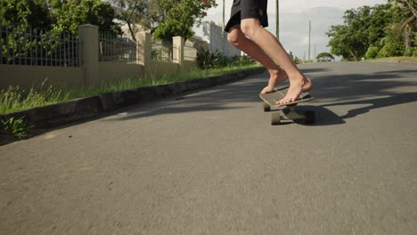 Young-Child-skate-boarding-home-on-a-late-afternnon,-4K