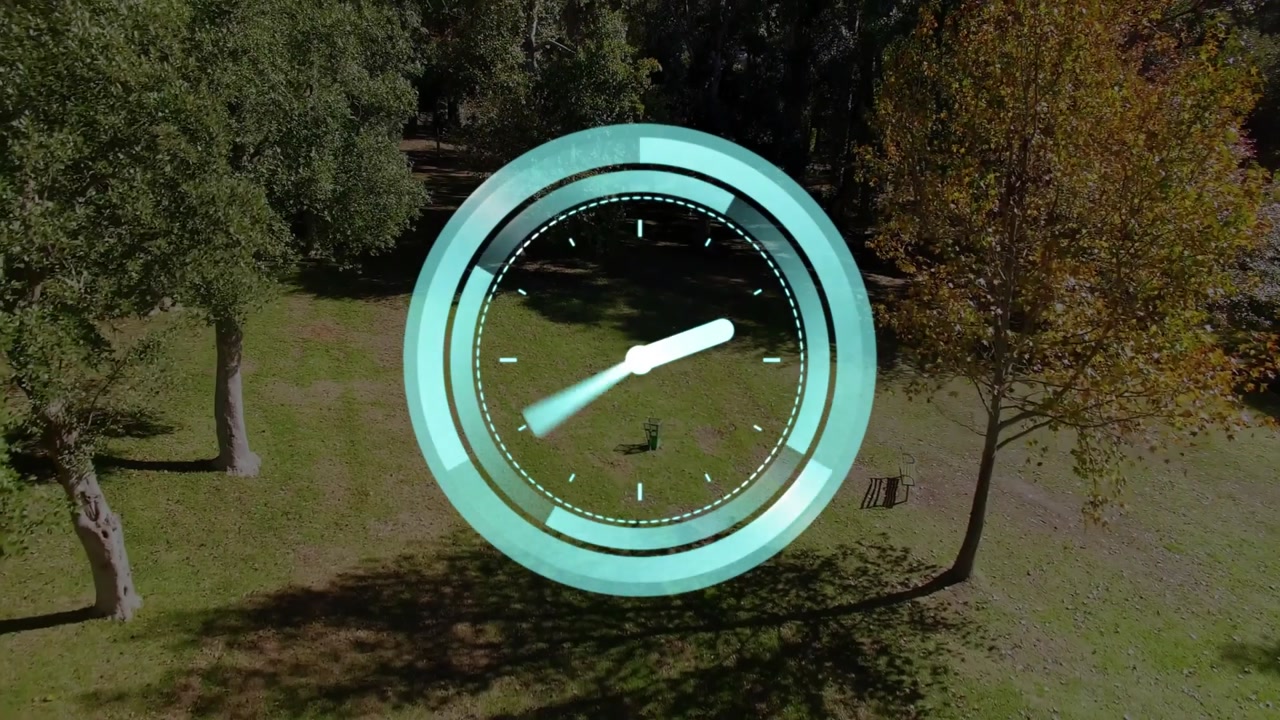 Aerial shot moving starting teal clock overlay animating above park, rotating hands showing time