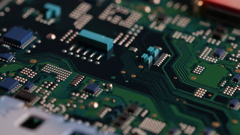 close-up of a green printed circuit board (pcb) with electronic components