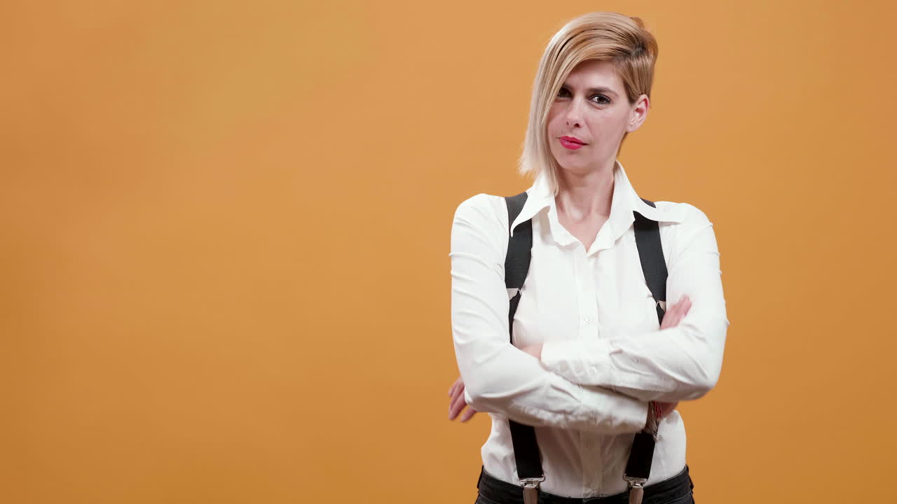 Woman in shirt and suspenders