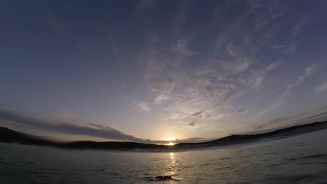 Time-lapse-of-clouds-and-sunrise-in-the-mountains-over-ocean,-Formation-of-cumulus-clouds,-beautiful-summer-landscape