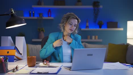 home office worker woman has shoulder pain.
