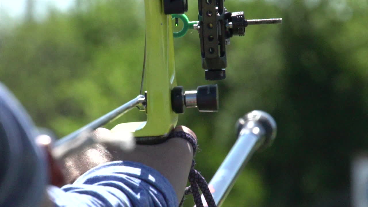 Arrow release in slow motion with light