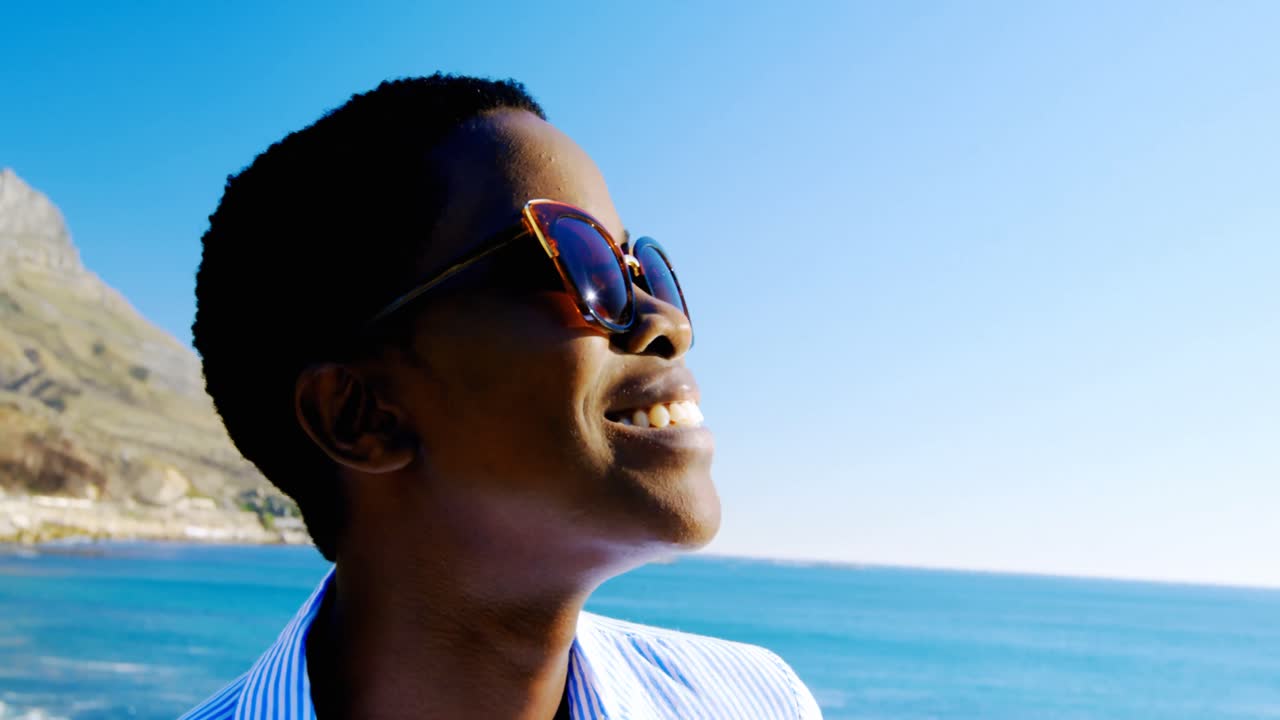 Woman smiling in the beach 4k