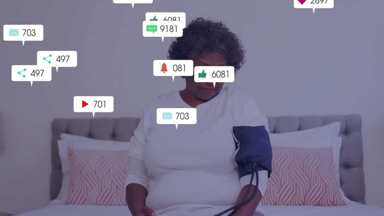 Senior woman pumping inflation bulb on BP cuff for tracking health with icons appearing around her