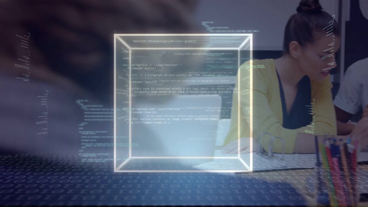 Business team reviewing papers at table scrolling code forming 3D cube overlaying central pair