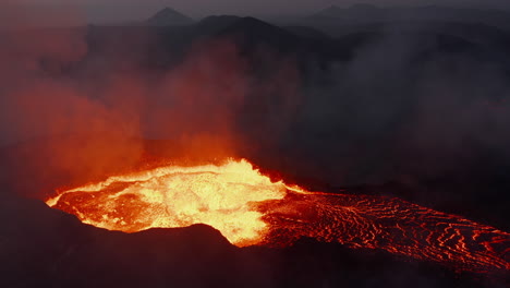 Fly-above-erupting-active-volcano.-Close-up-shot-of-splashing-magmatic-material-in-crater.-Fagradalsfjall-volcano.-Iceland,-2021