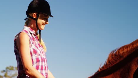 Friends-riding-horse-in-ranch-4k