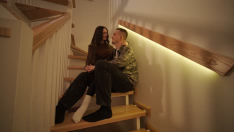 a loving couple is spending time at home.