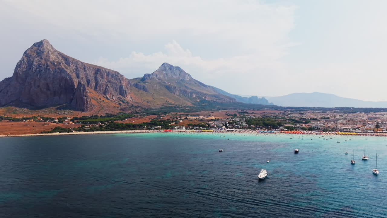 Coastal Scenery with Boats and Mountains