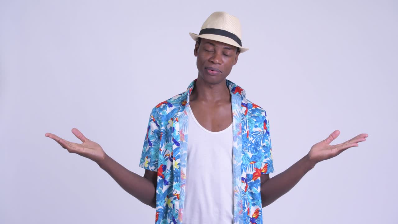Young handsome African tourist man ready for vacation