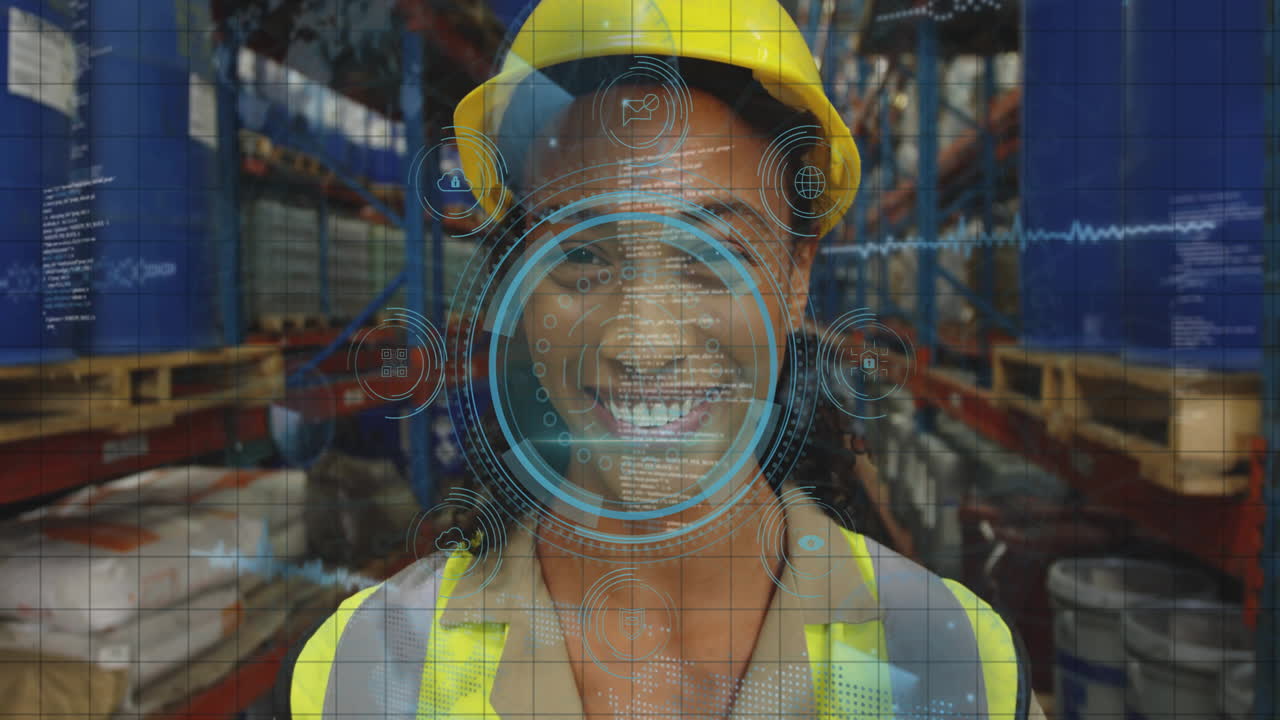 In factory, worker in safety gear interacting with digital animation overlay