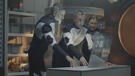 scientists working in a futuristic space lab