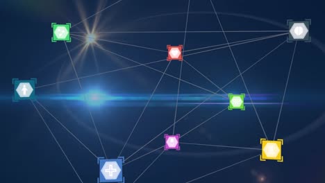 red de iconos digitales contra el punto de luz y el destello de la lente sobre un fondo azul