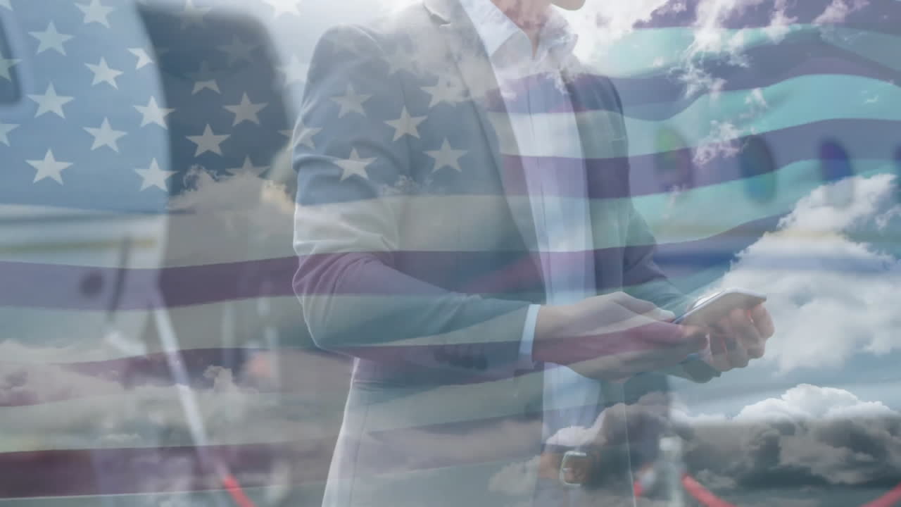 American flag animation overlaying business people using smartphones outdoors